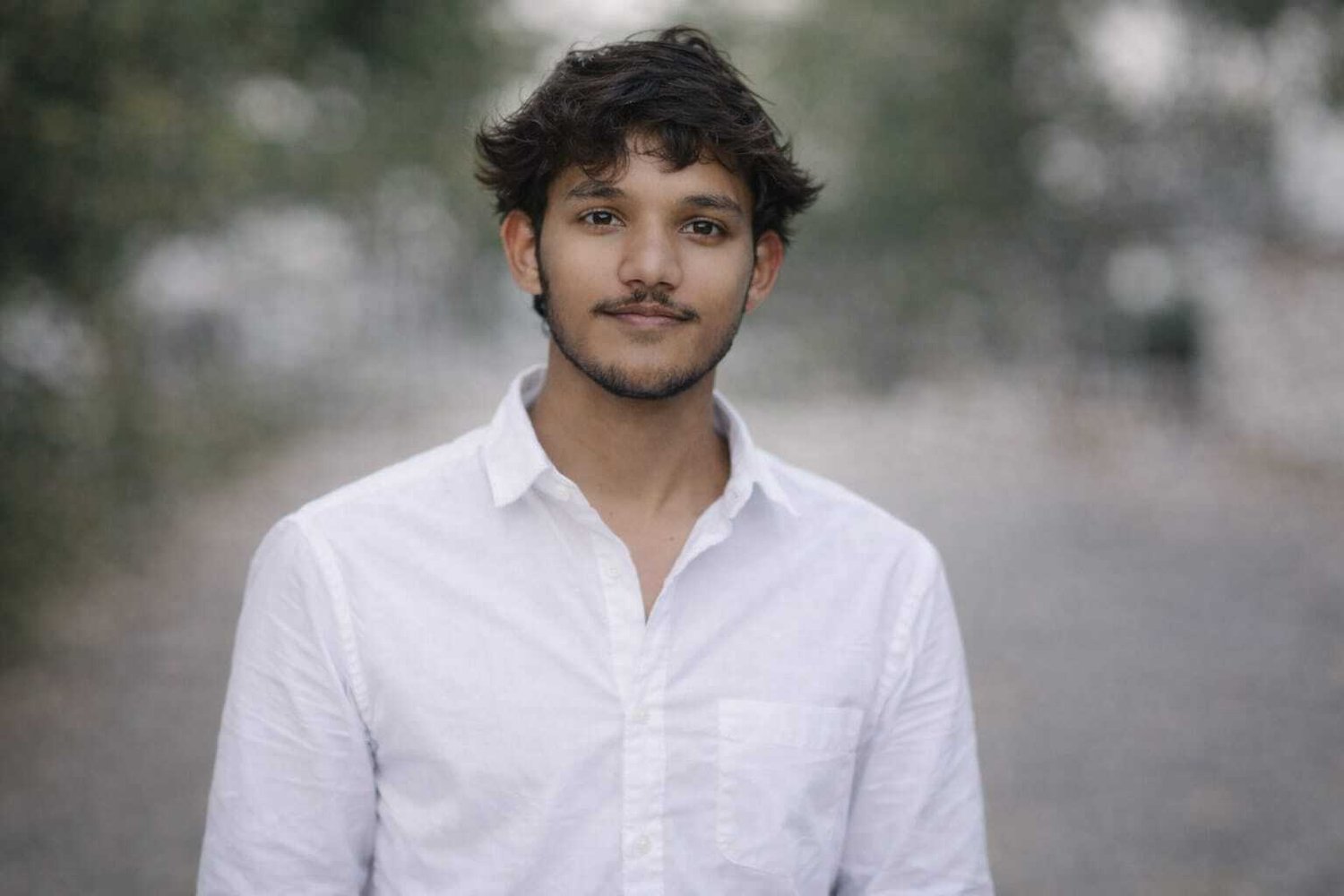 Aman Vishwakarma — portrait in a white shirt, Mumbai